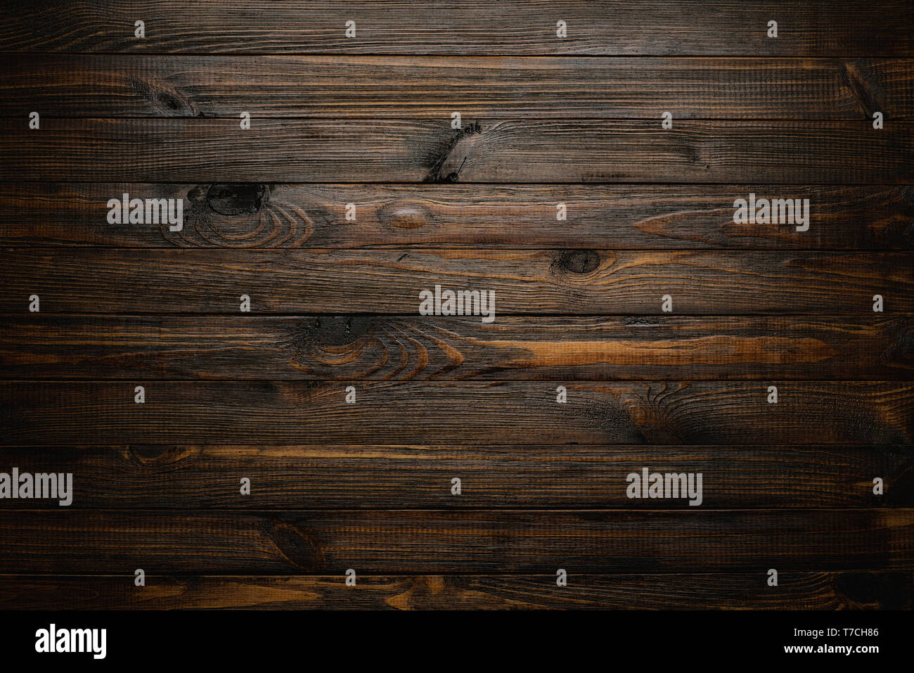 Natural wood background. Wood texture. Table of blank dark rustic planks top flat lay view. Stock Photo