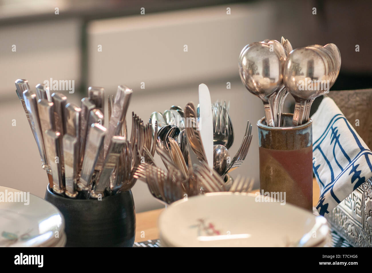 Silver cutlery ready for a dinner party Stock Photo