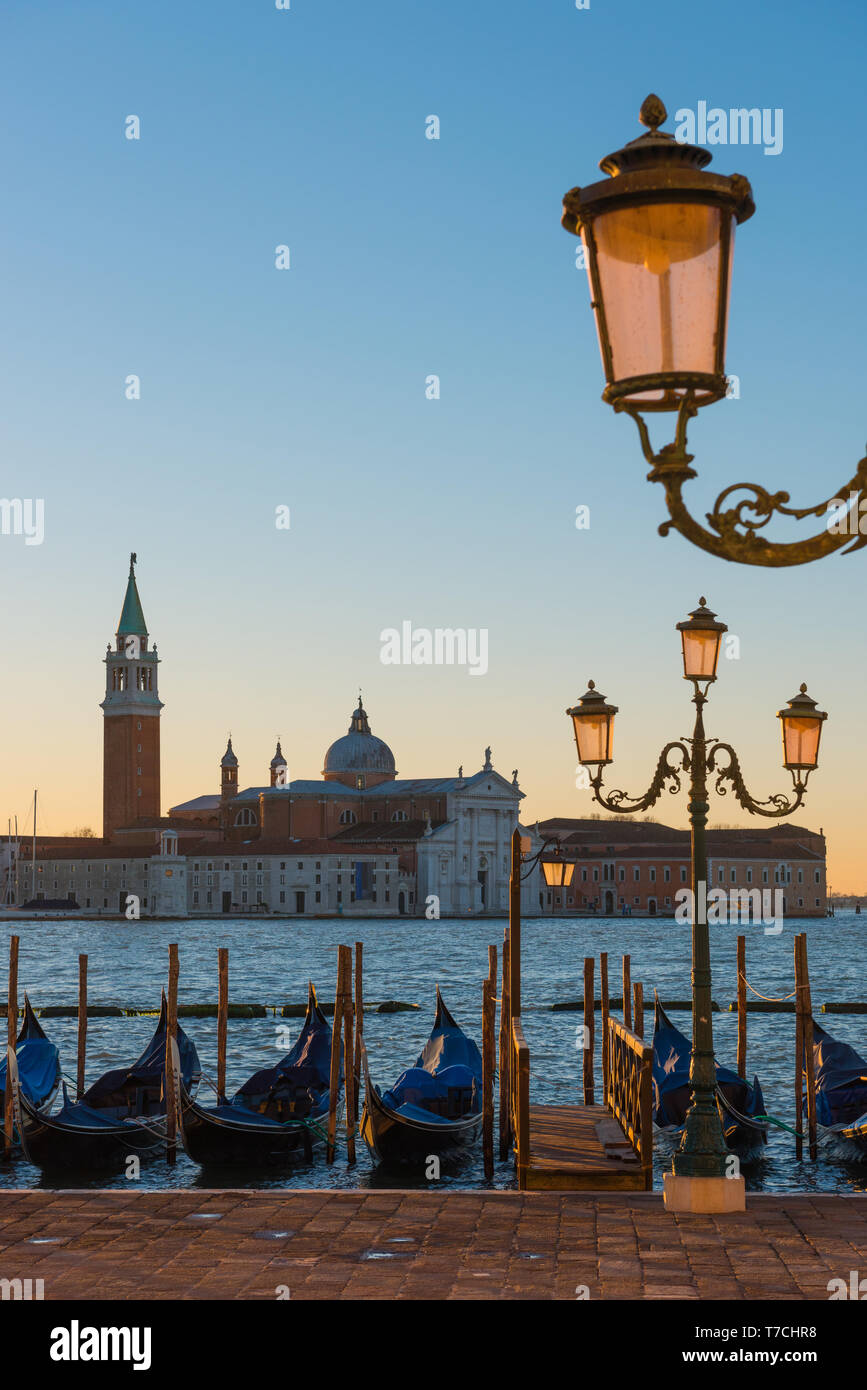 Venice Italy seafront with gondolas at sunrise Stock Photo - Alamy