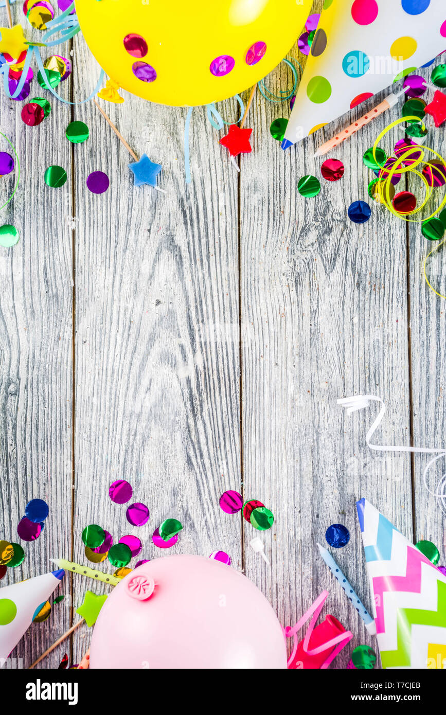 Birthday decorations with pastel balloons on white background Stock Photo -  Alamy