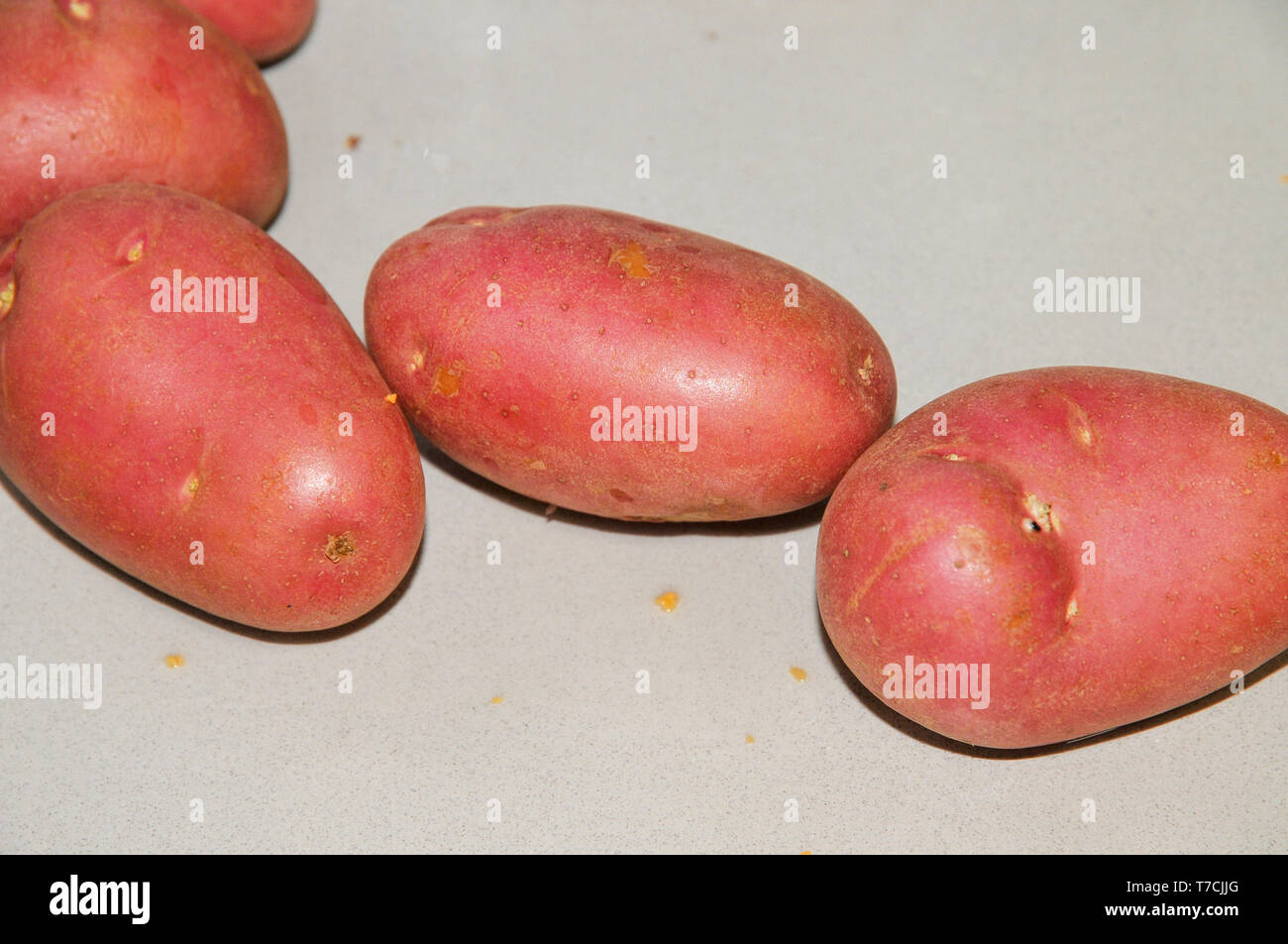 Fresh organic potatoes on white background Stock Photo Alamy