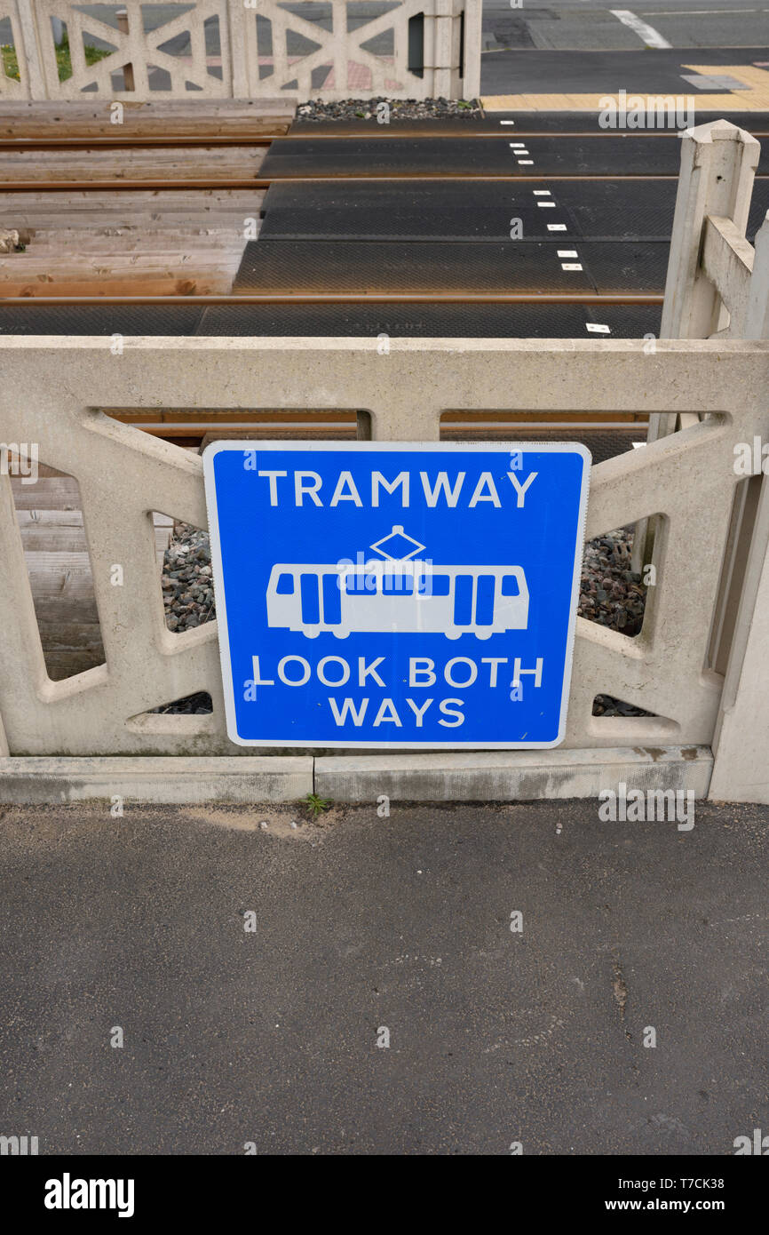 Tramway Sign Tramway look both ways blue and white warning sign mounted on concrete ...