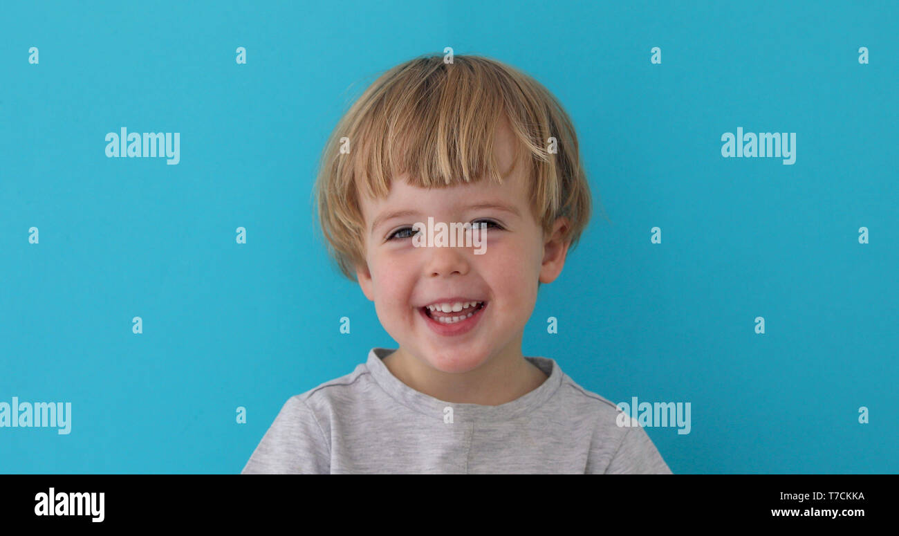 Little boy laughing at camera Stock Photo