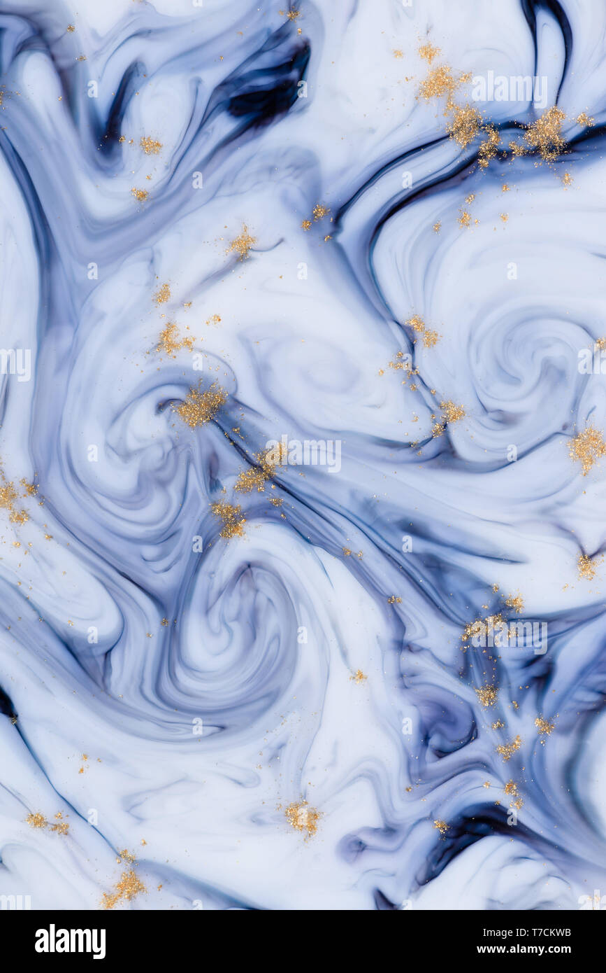Marbled unique blue abstract background with gold dust Stock Photo