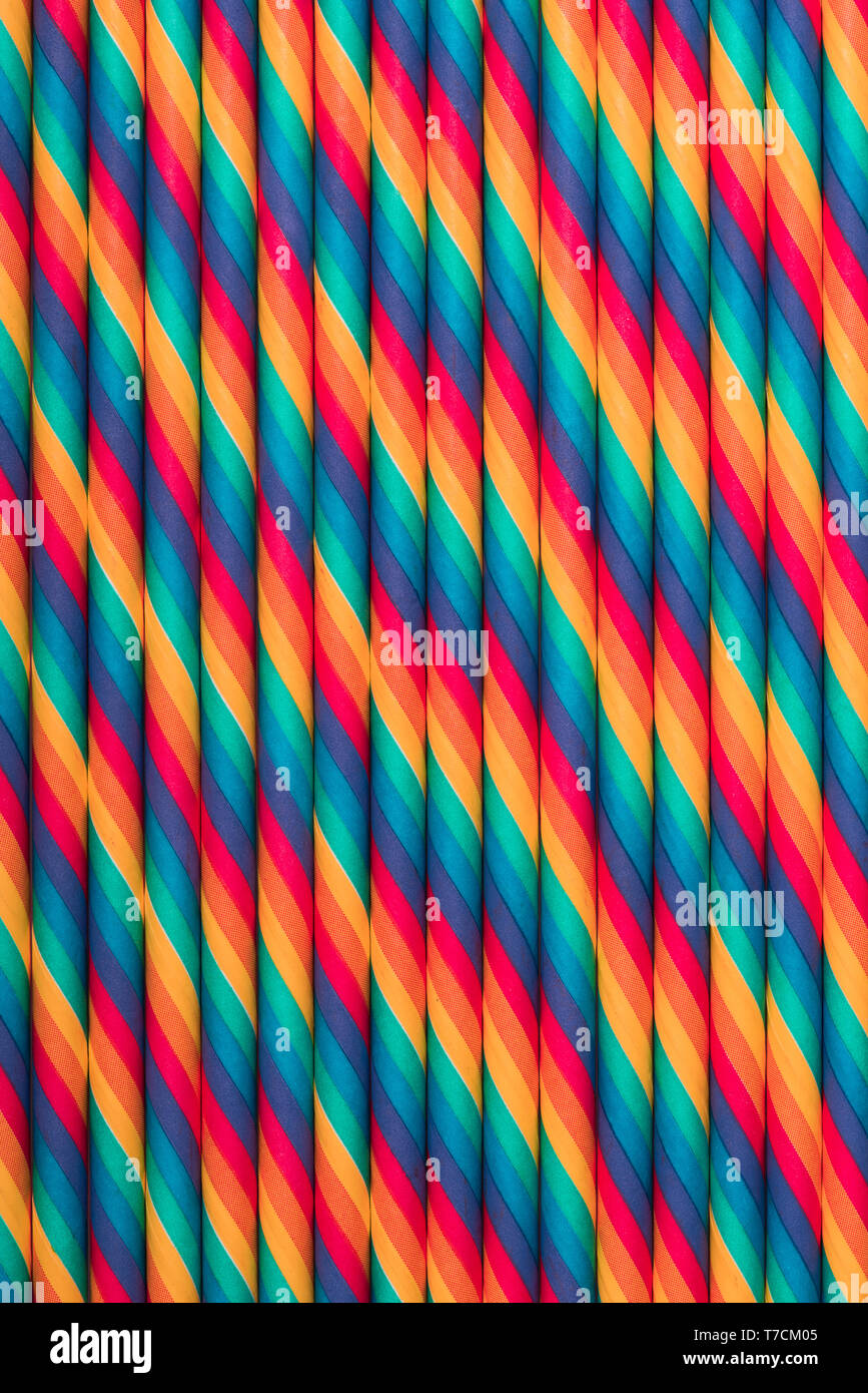 Vintage colored paper straws abstract background Stock Photo