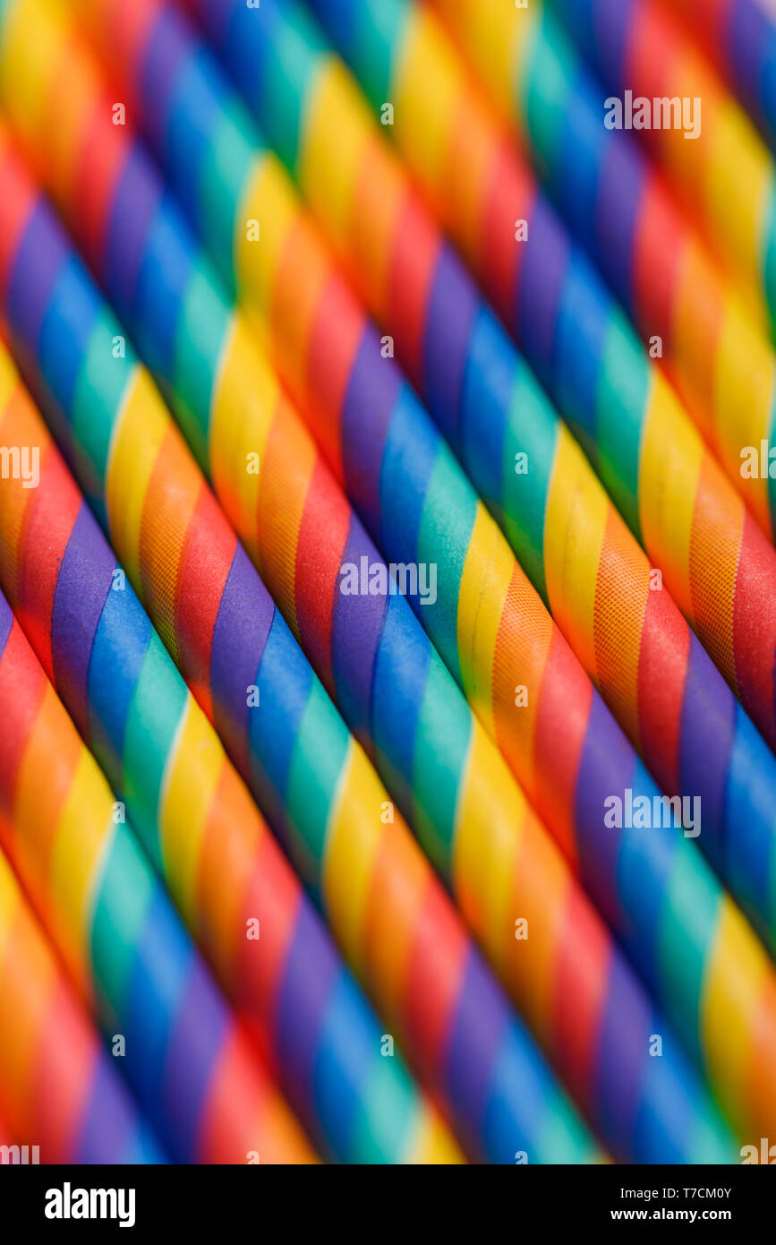 Striped multicolored straws macro background Stock Photo