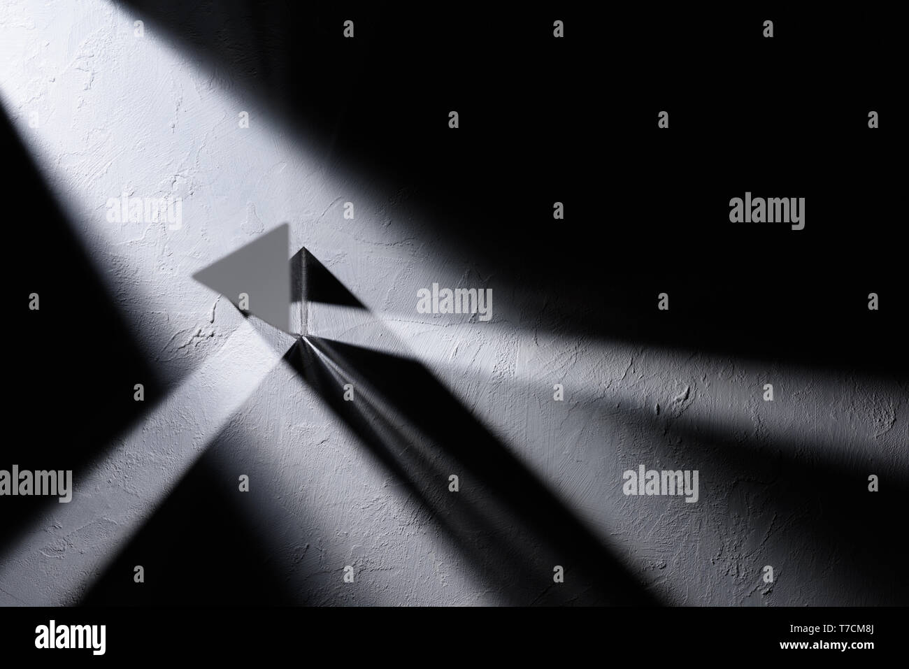Prism refracting light top view Stock Photo