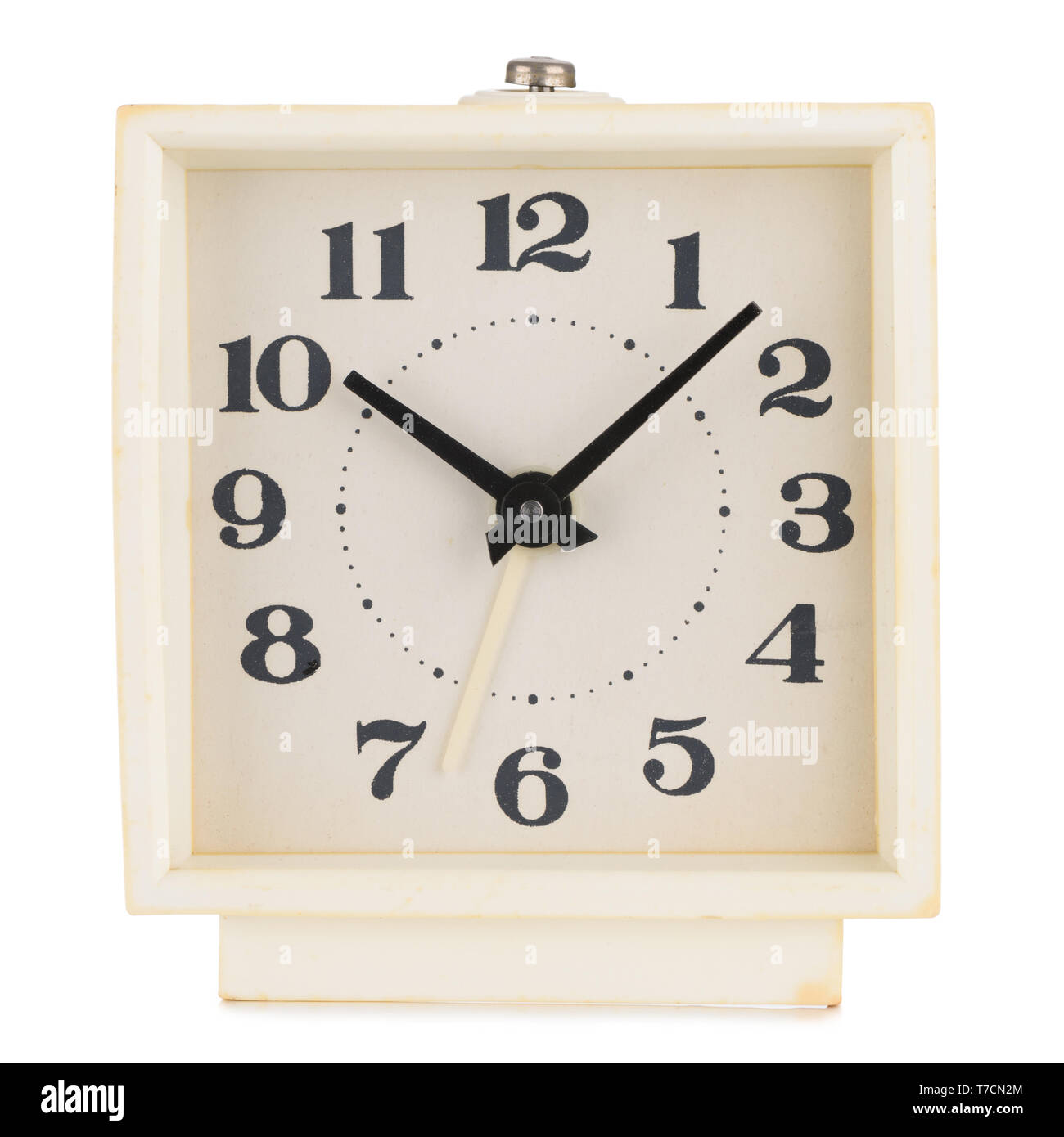 Retro alarm clock white plastic yellowed isolated on white background Stock Photo