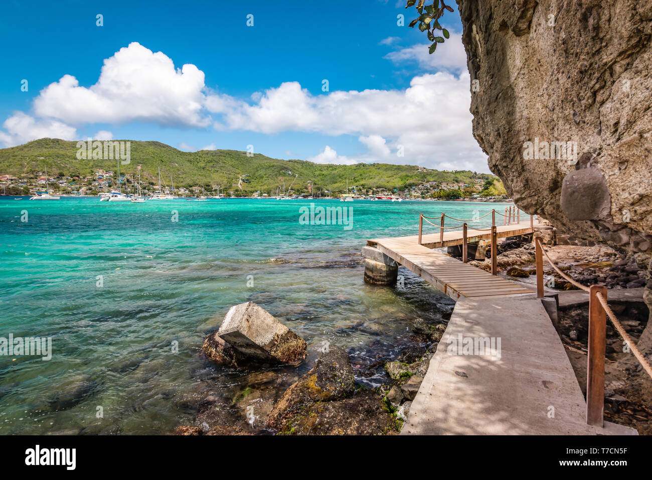 A new cliff side boardwalk trail from Belmont beach to Princess Margaret beach, Bequia Island. Stock Photo