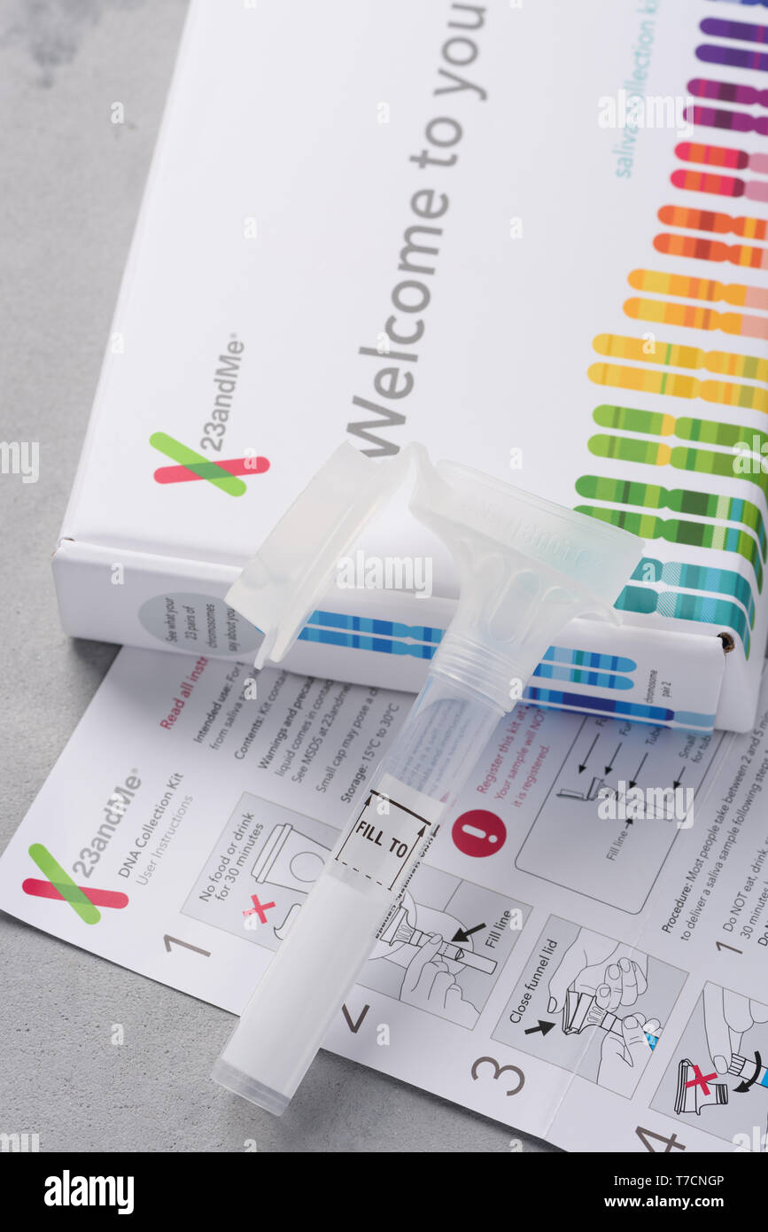 Kiev, Ukraine - 17 October 2018: 23andMe new personal ancestry genetic test saliva collection kit, tube, box and instructions. Illustrative editorial. Stock Photo