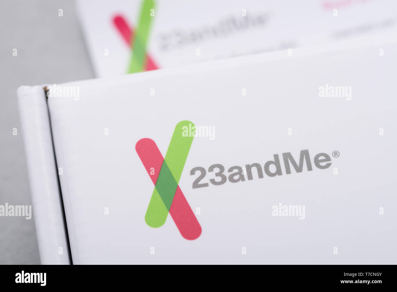 Kiev, Ukraine - 17 October 2018: 23andMe logo closeup on personal genetic test saliva collection kit. Illustrative editorial. Stock Photo