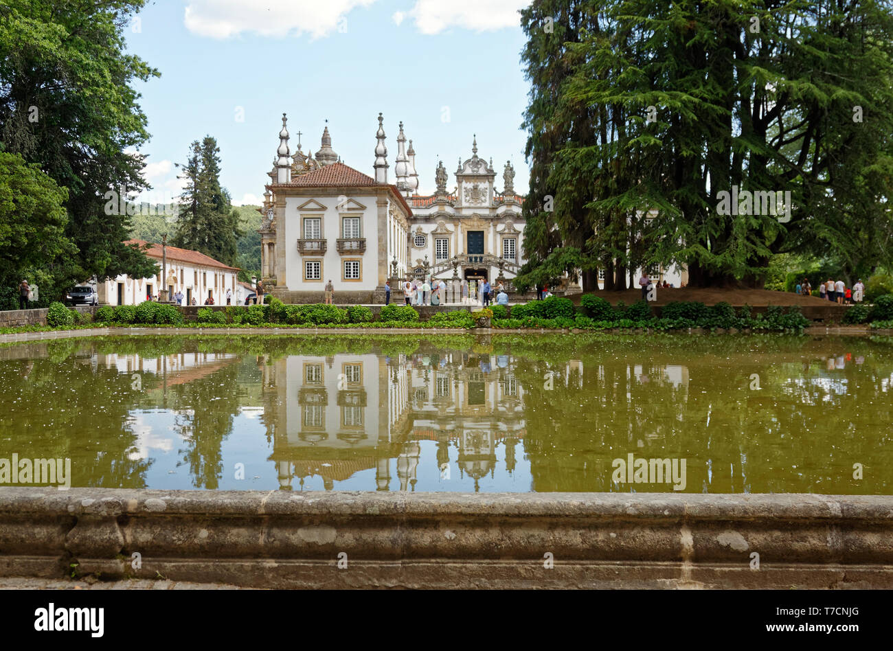 Mateus Estate and Winery; reflected in pond, 18 century; old Baroque building; elegant mansion, chapel, Europe; Vila Real; Portugal; spring, horizonta Stock Photo
