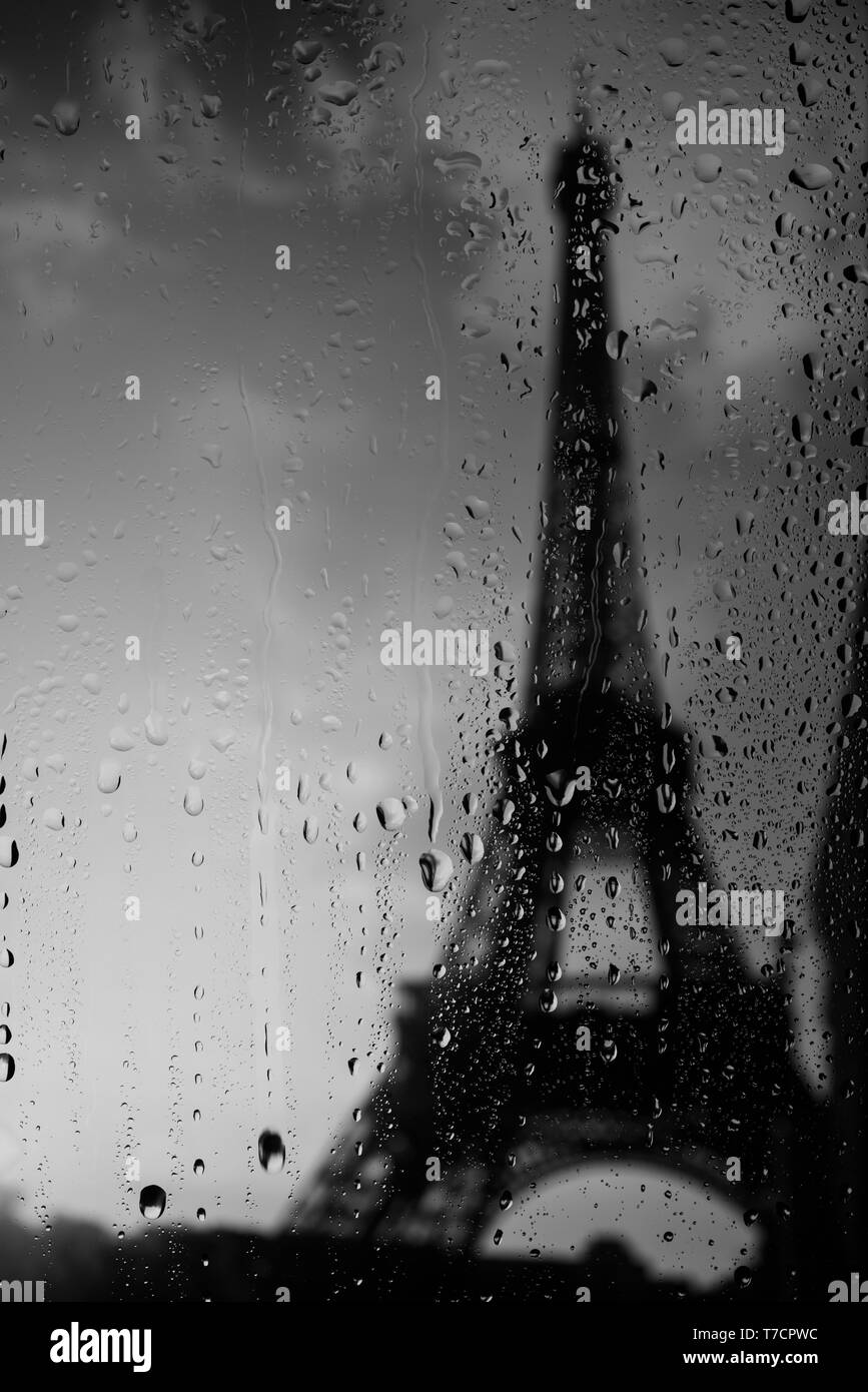 Paris at autumn rainy weather Eiffel tower dark silhouette Stock Photo