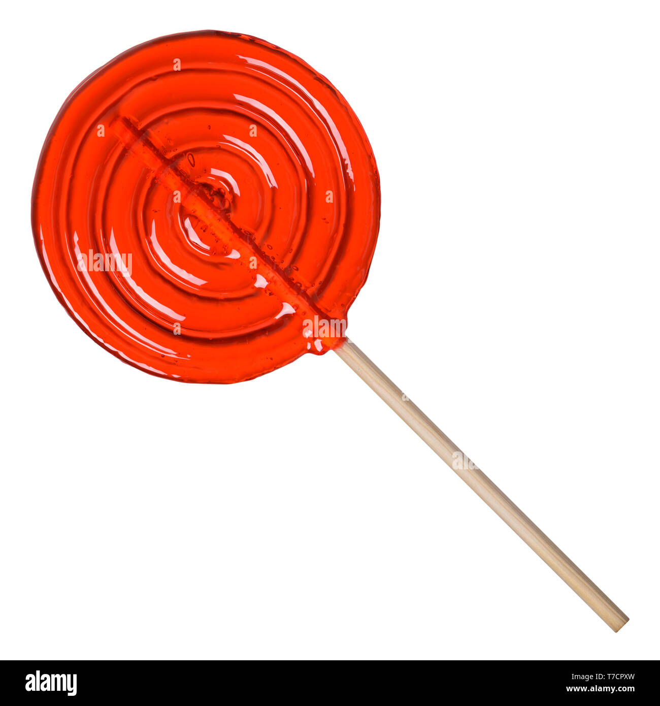 Big red lollipop transparent sugar candy on wooden stick isolated on