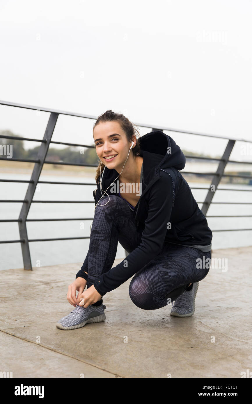 Curated visual reference: Intuitive Bow Adjustment For Efficient Close Up Tying Reference: Closeup Hands Tying Up Laces Hi Res Stock Photography And