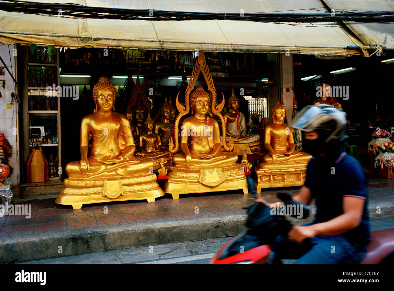 Buddha statues in Bamrung Muang Road in Bangkok in Thailand in Southeast Asia Far East. Buddhism Buddhist Religion Spirituality Stock Photo