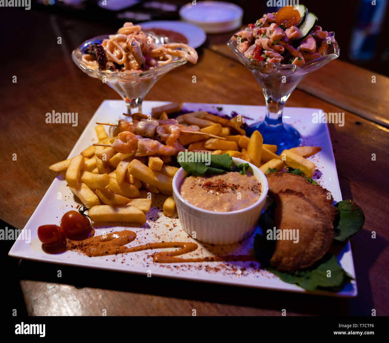 different preparations served on a large plate to share with friends in a pub Stock Photo