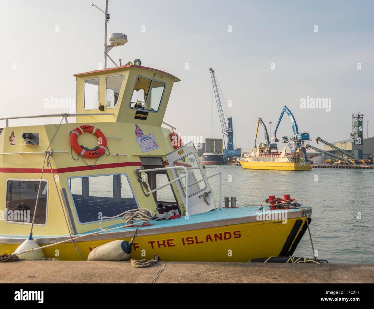 Yellow ferry boat in Poole Harbour, Dorset, UK Stock Photo Alamy