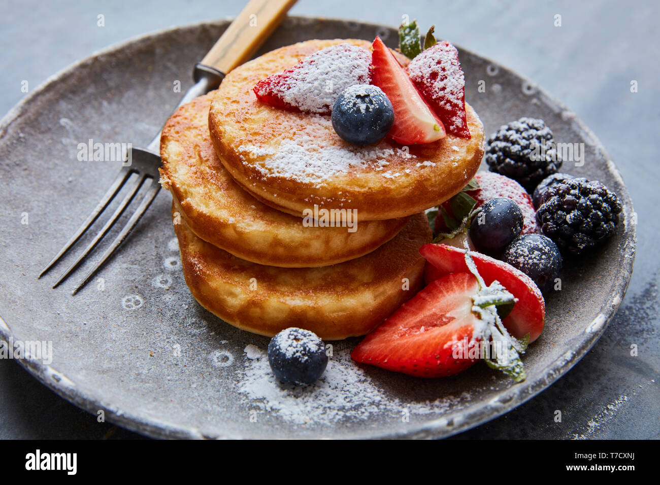 Fresh brunch pancakes with berries Stock Photo