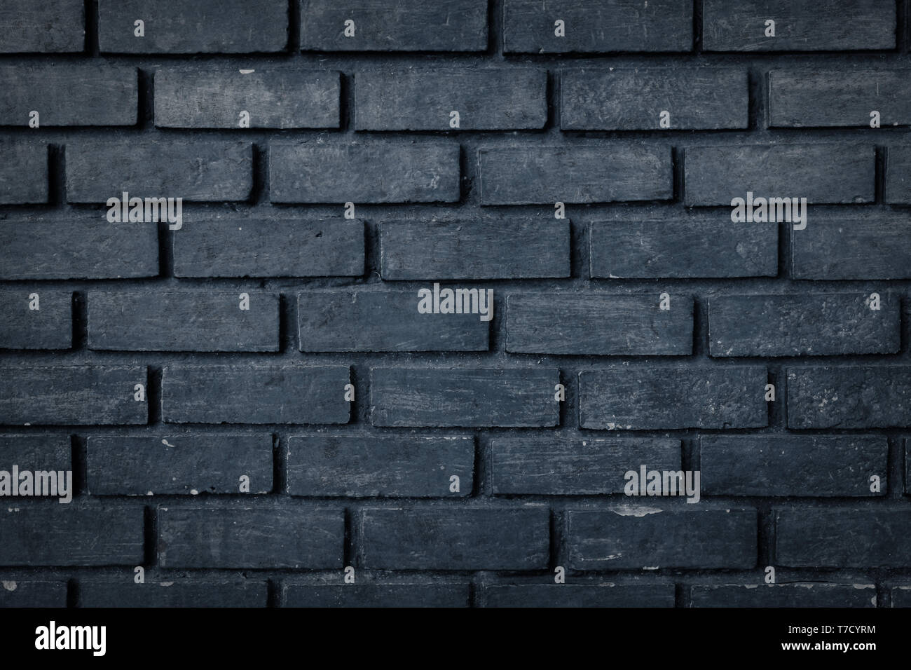 Old black brick wall texture background Stock Photo