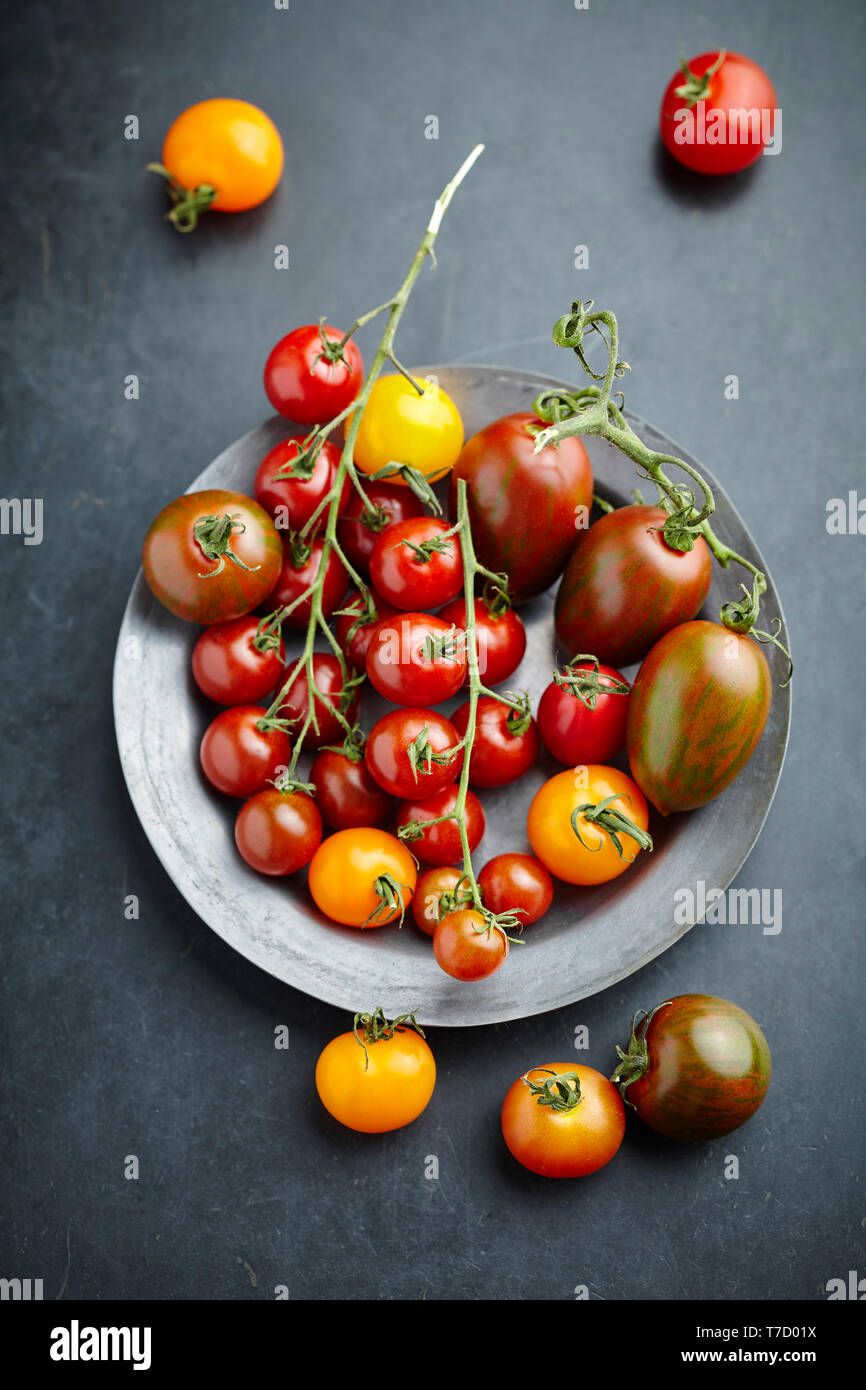 Mix of different types of tomatoes Stock Photo