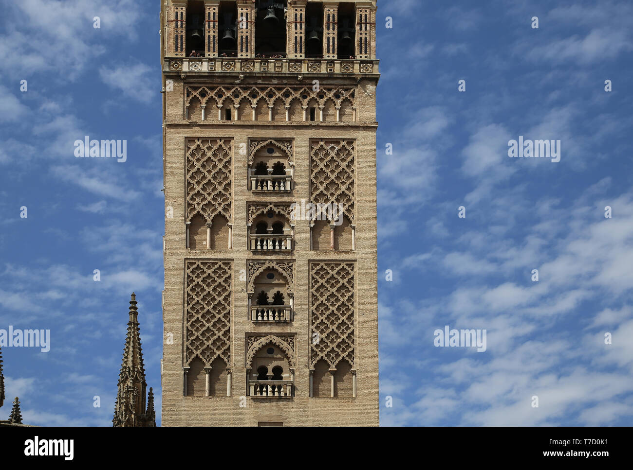 Spain. Andalusia. Seville. The Giralda Tower, ancient minaret of Great Mosque. Almohad style. 12th century. Seville Cathedral. Stock Photo