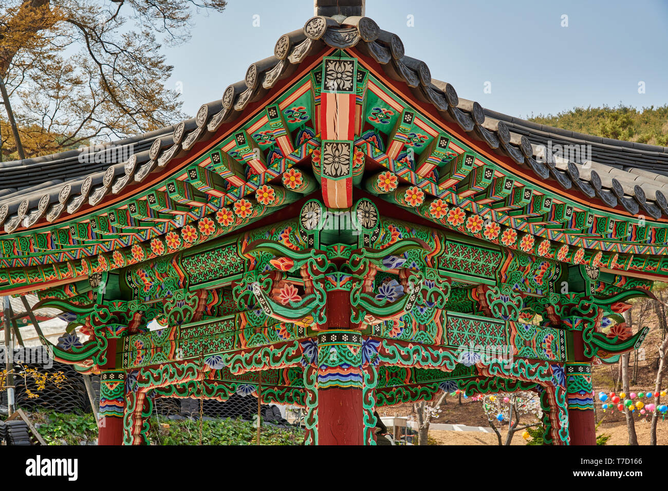 detail of bell pavilion Hanok style of Baekunsa Temple or 'White Cloud Temple' on Yeonjondo Island, Incheon, South Korea Stock Photo