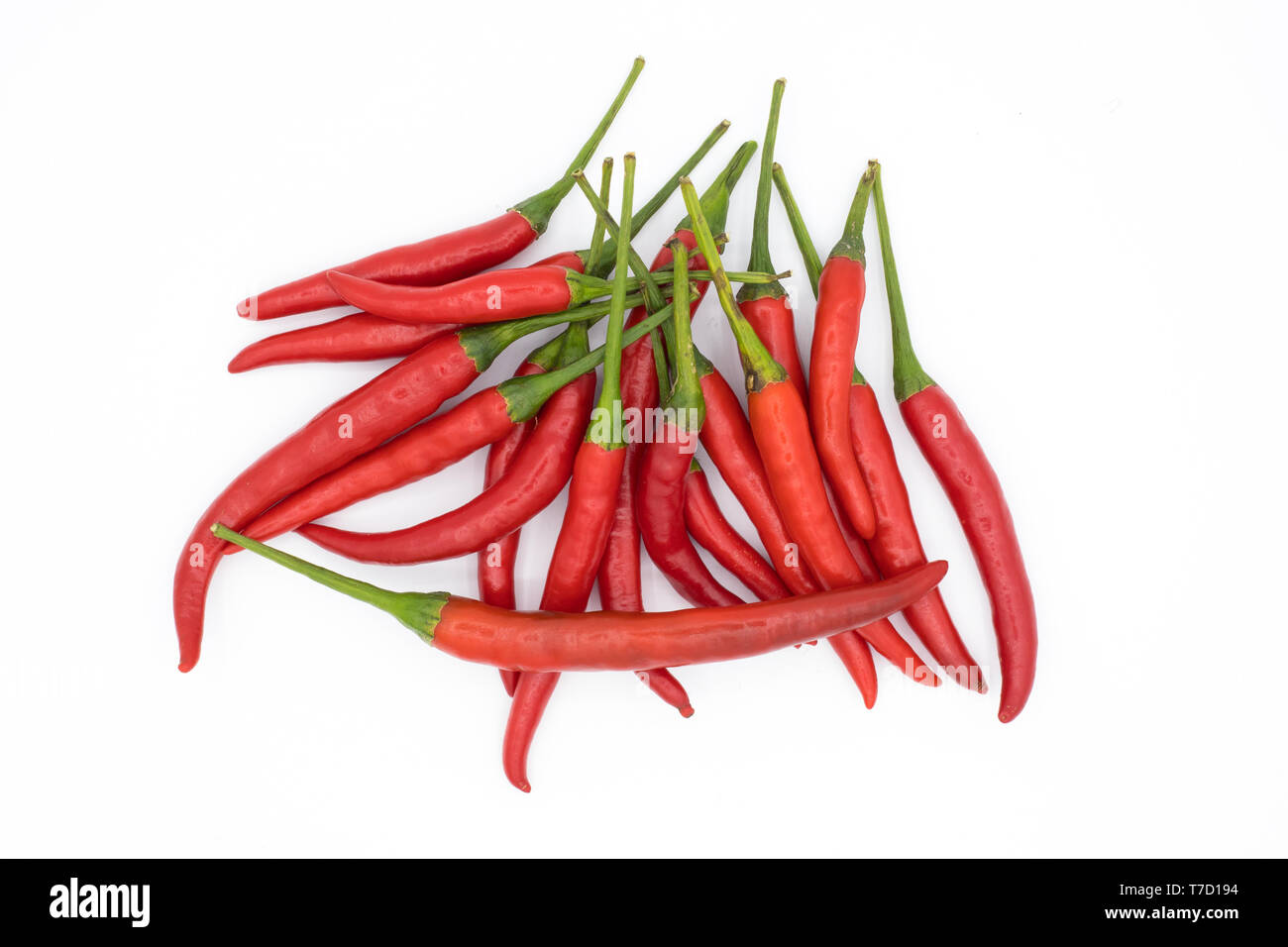 Chili peppers isolated on white background Stock Photo - Alamy