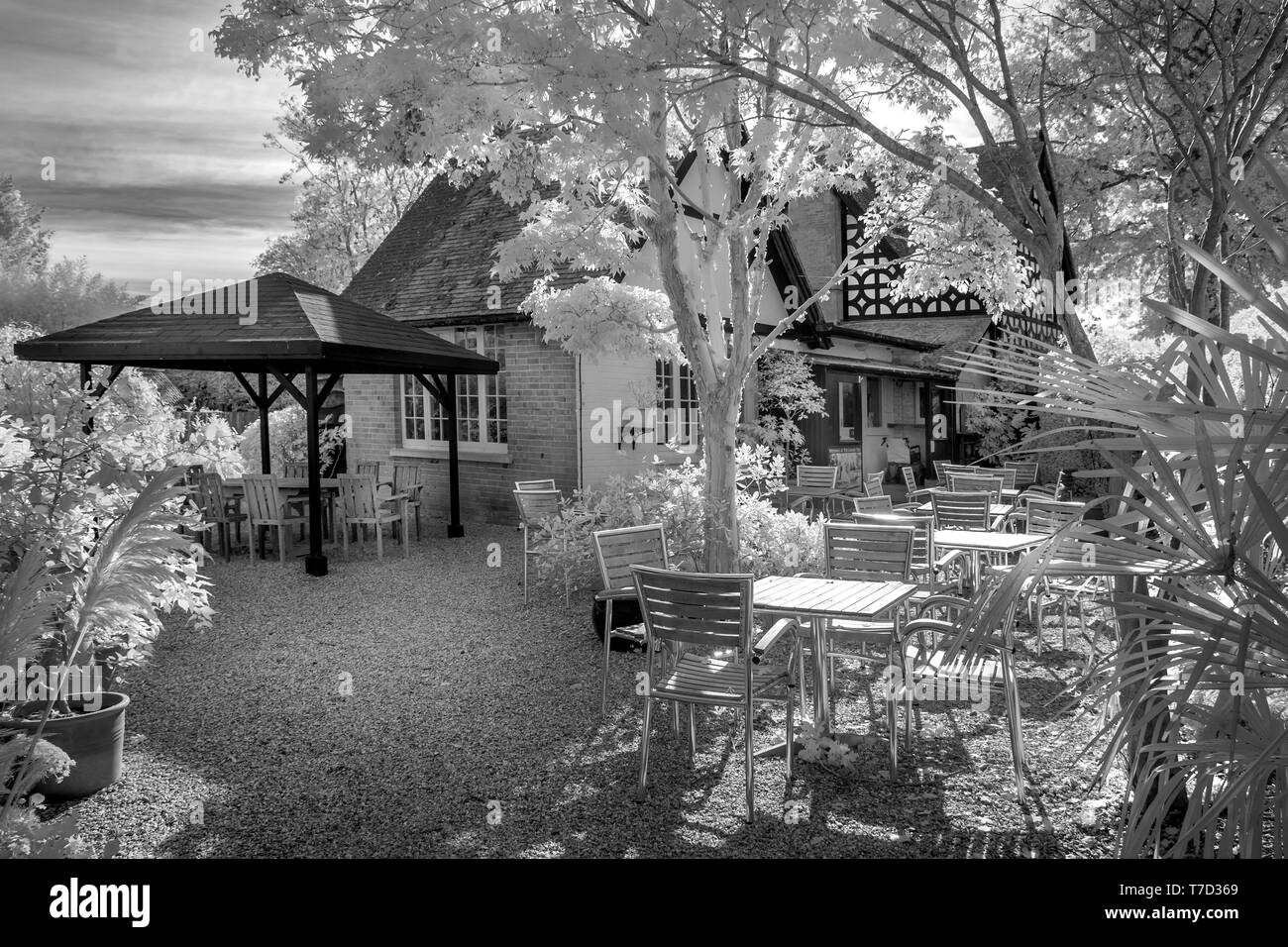 Infrared monochrome image of the Larmer Tree tea rooms, larmer tree gardens, wiltshire UK Stock Photo