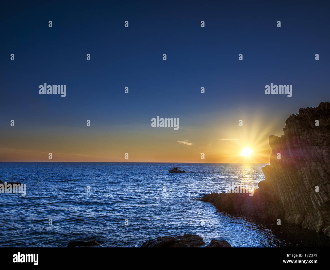 Sunset at coast of Riomaggiore, Cinque Terre, Italy Stock Photo