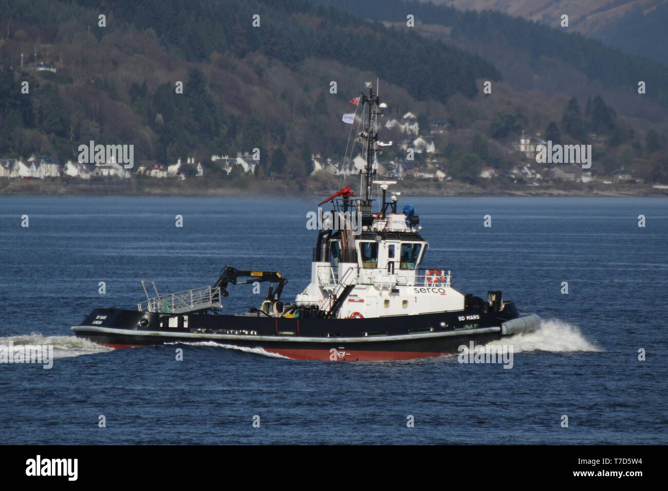 SD Mars, a Damen STAN 2608 tug operated by Serco Marine Services, passing Gourock during Exercise Joint Warrior 19-1. Stock Photo