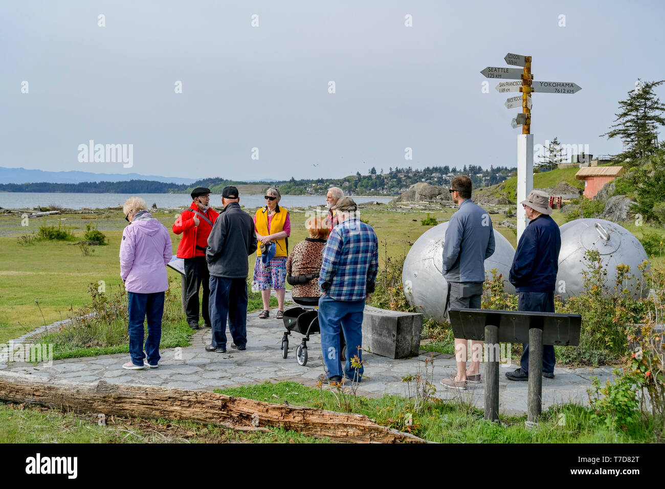 Tourists on Interpretive walk talk, Fort Rodd Hill and Fisgard Lighthouse NHS, Victoria, British Columbia, Canada Stock Photo