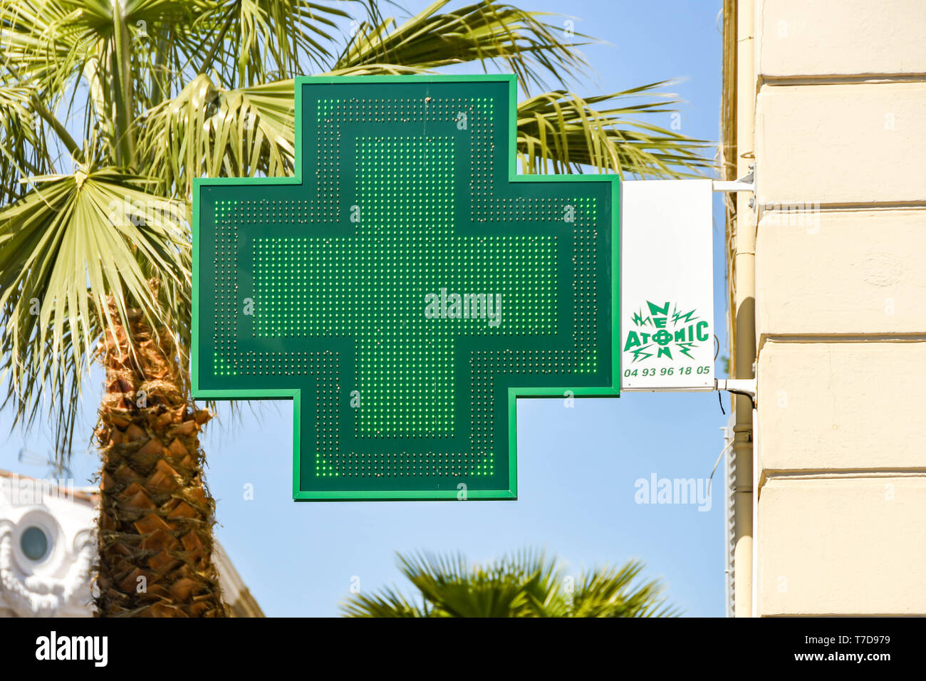 CANNES, FRANCE - APRIL 2019: Illuminated electronic LED sign outside a pharmacy in Cannes. Stock Photo