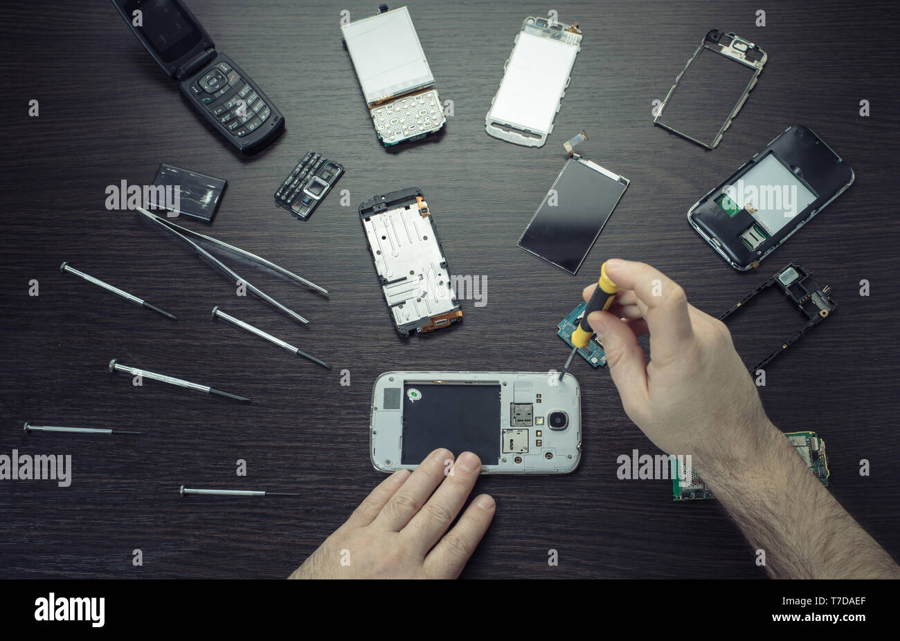 Man hands screwdriver repair hi-res stock photography and images - Alamy
