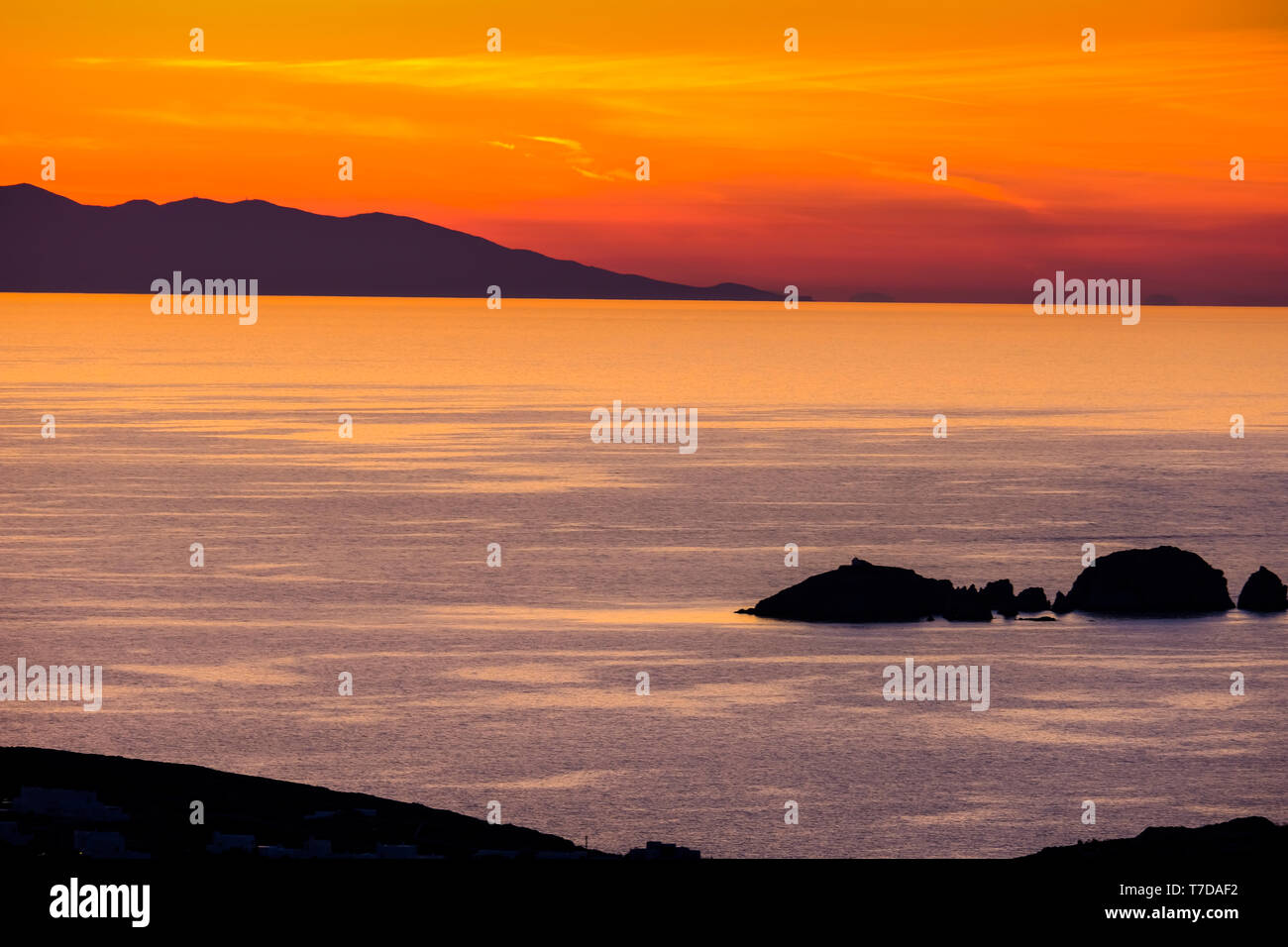 Coastal landscape at sunset near Parikia. Paros island. Cyclades islands. Greece. Stock Photo