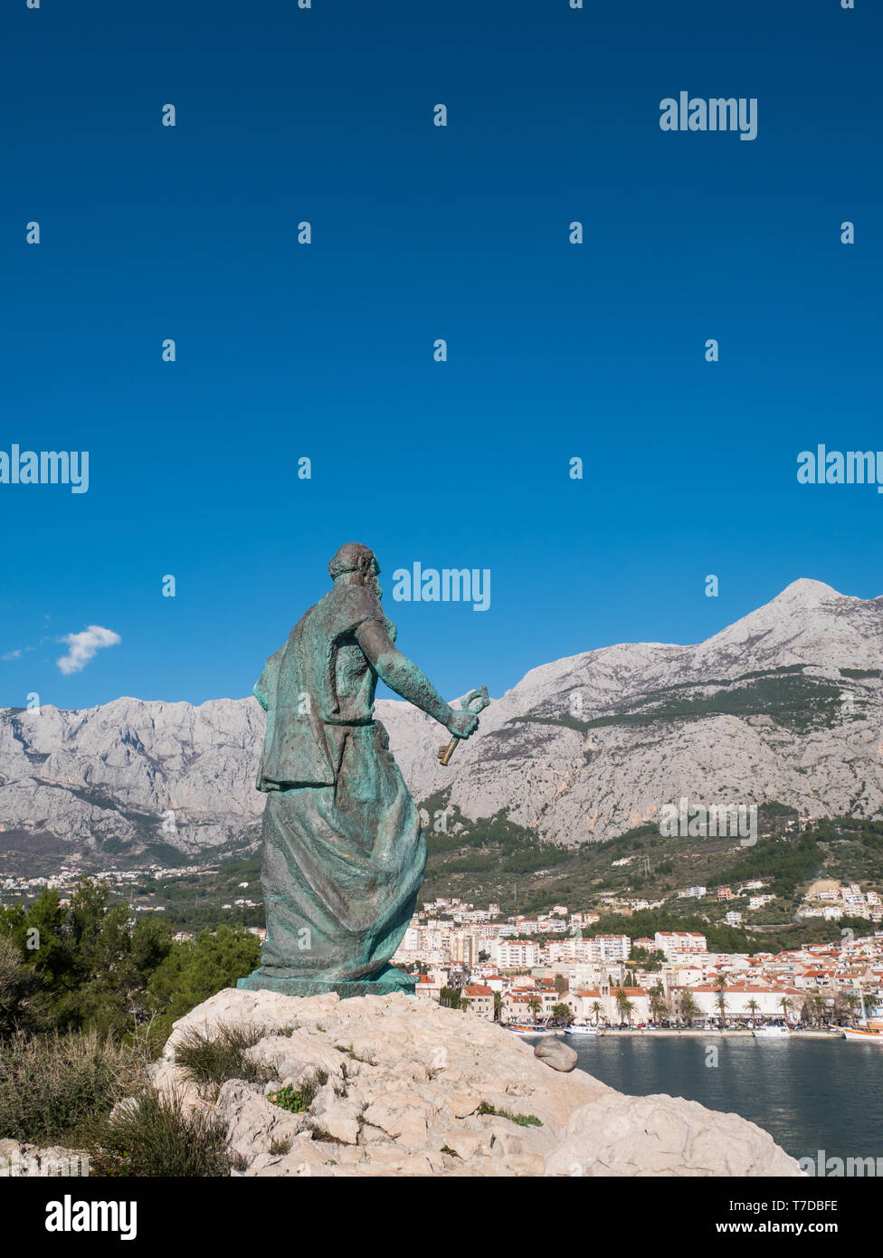 Editorial - Statue of Saint Peter with key in hands in Makarska on sunny day Stock Photo