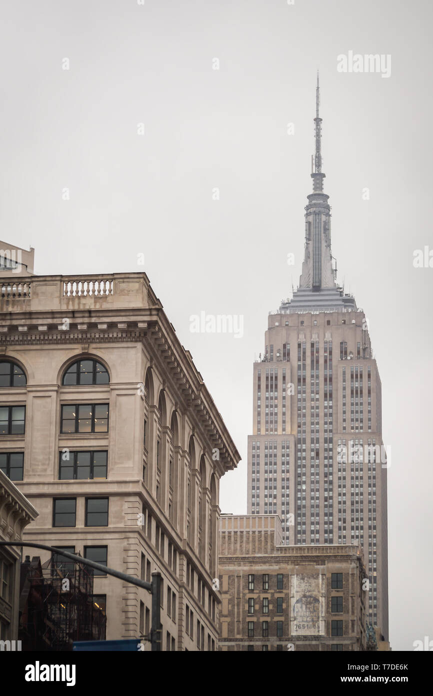 The Empire State Building from midtown Manhattan in New York Stock ...