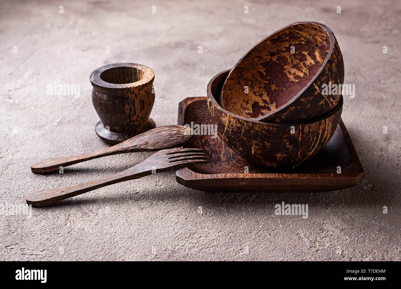 Bowls and plates made from coconut shell Stock Photo Alamy
