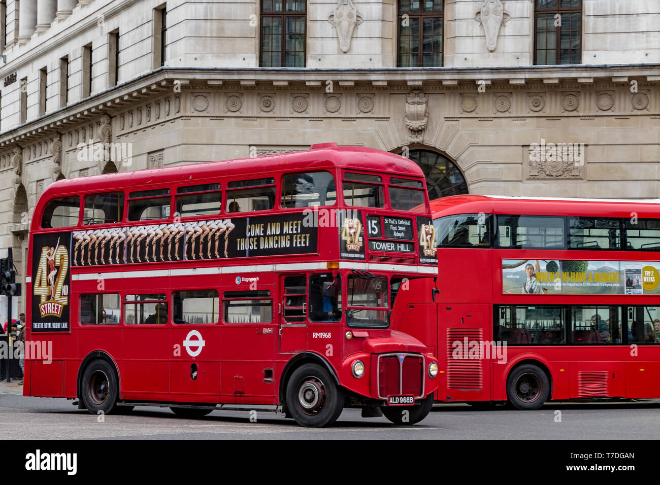 A No15 Routemaster on the 15 heritage route passes through Bank Junction in The City Of London on it's way to Tower Hill, London ,UK Stock Photo
