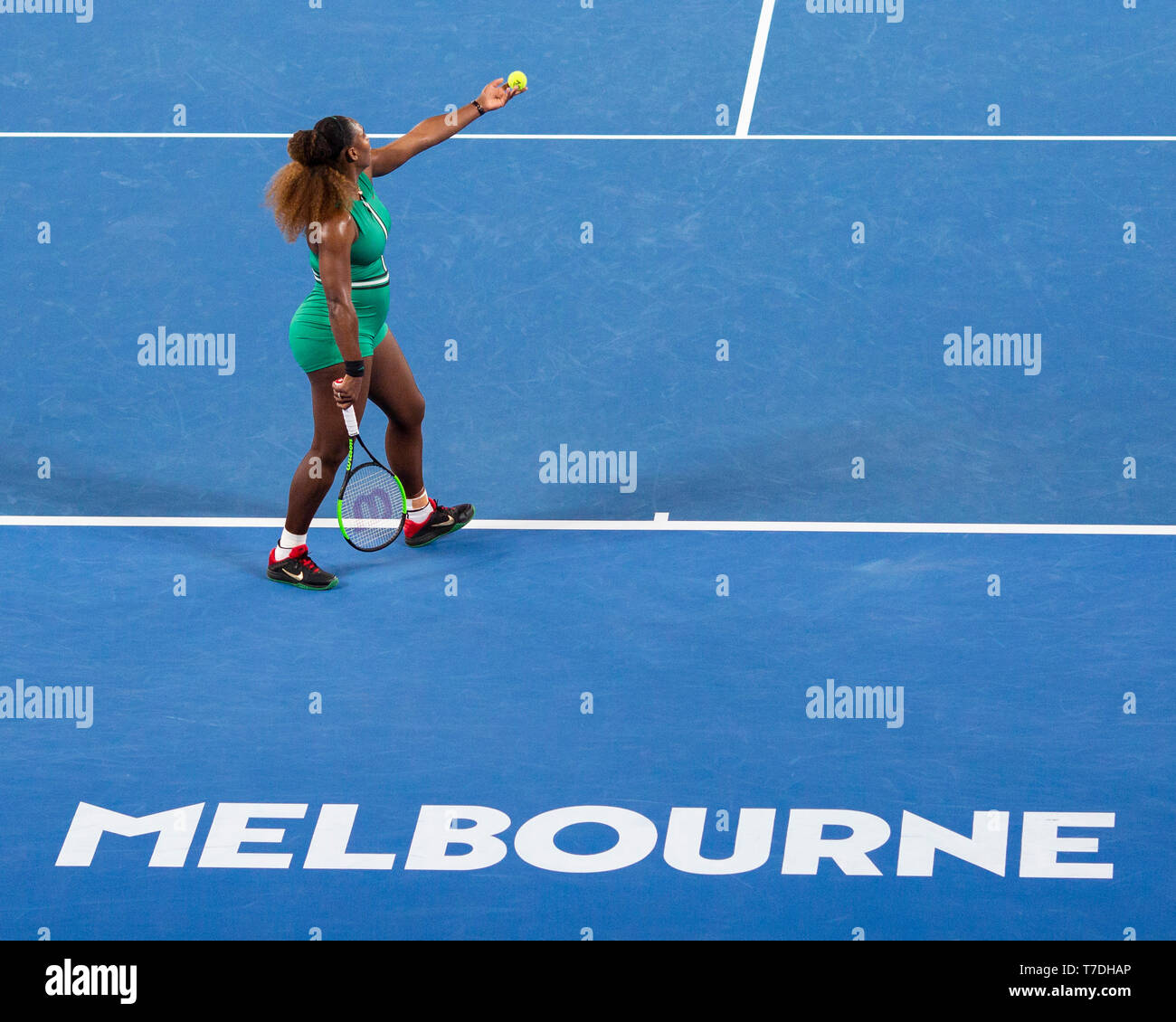 American tennis player Serena Williams serving in Australian Open 2019 tennis tournament, Melbourne Park, Melbourne, Victoria, Australia Stock Photo