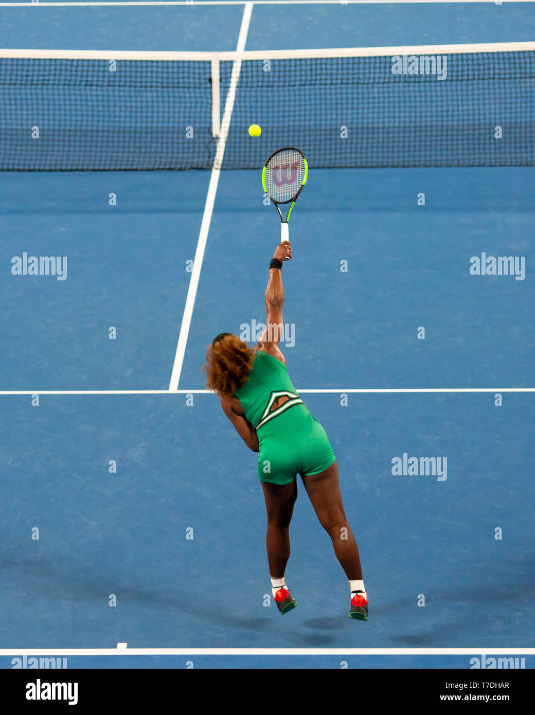 American tennis player Serena Williams serving in Australian Open 2019 tennis tournament, Melbourne Park, Melbourne, Victoria, Australia Stock Photo