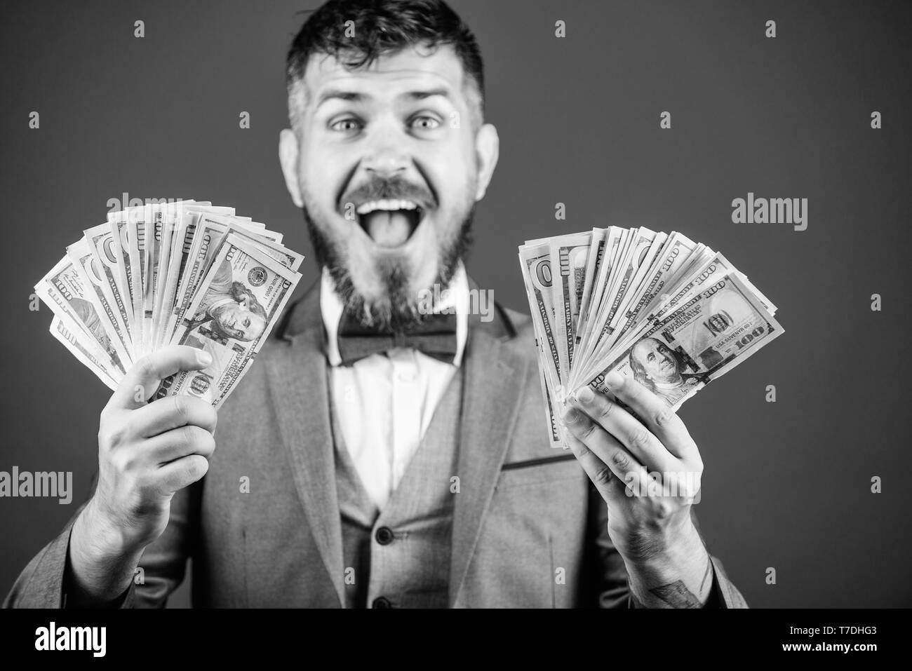 Holding Money To Flush Black And White Stock Photos & Images - Alamy