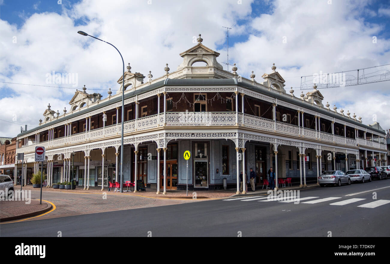 Facade of the heritage listed Imperial Hotel built in 1889 and ornamented with cast-iron friezework, bullnose awnings and parapets with Grecian urns a Stock Photo