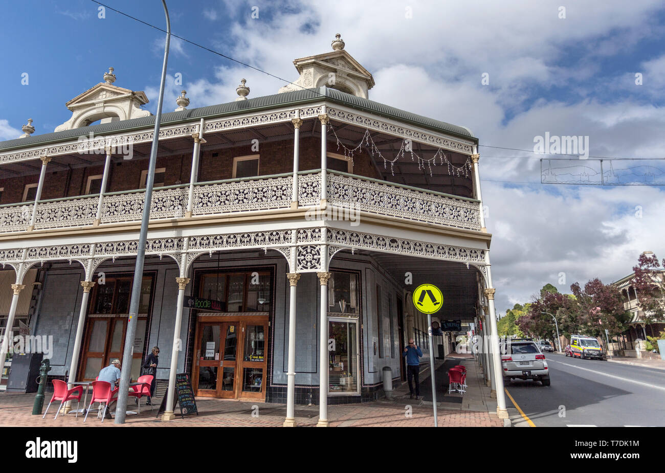 Facade of the heritage listed Imperial Hotel built in 1889 and ornamented with cast-iron friezework, bullnose awnings and parapets with Grecian urns a Stock Photo