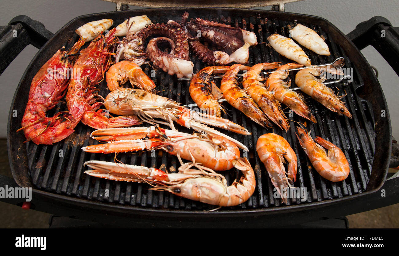 Seafood on a BBQ Stock Photo - Alamy