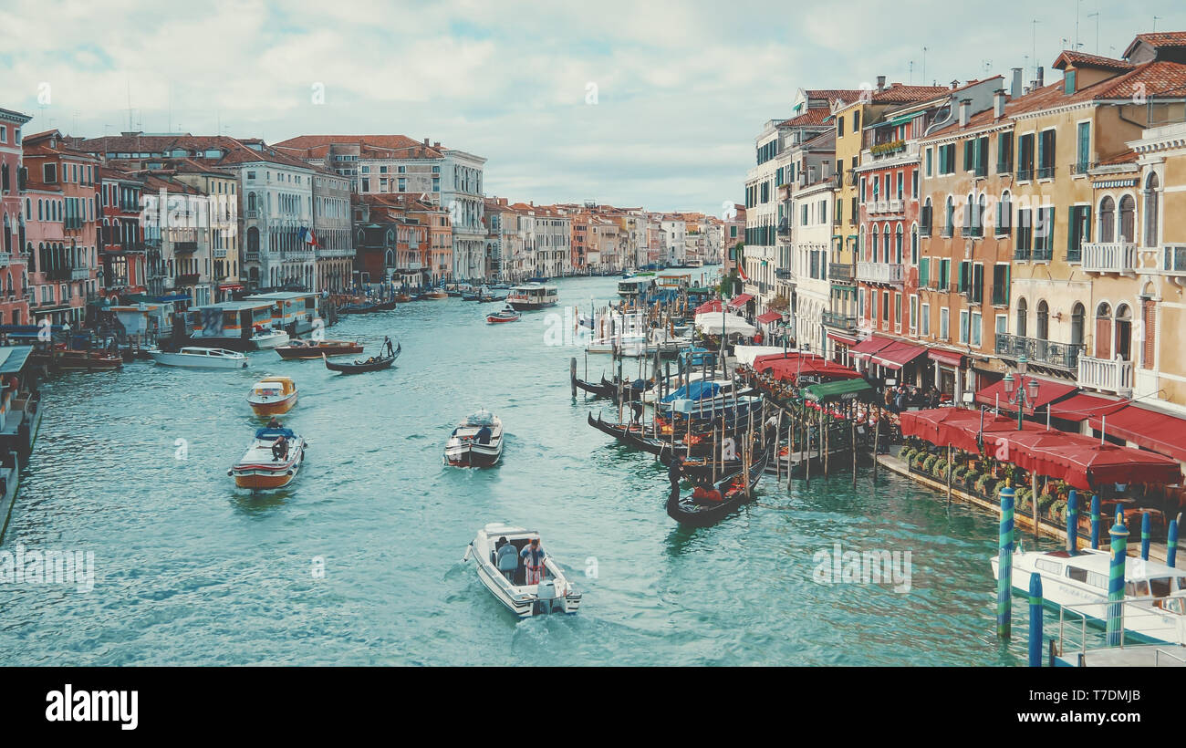 Venice, Italy - Boats and Skyline Along  Grand Canal, faces logos blurred Stock Photo