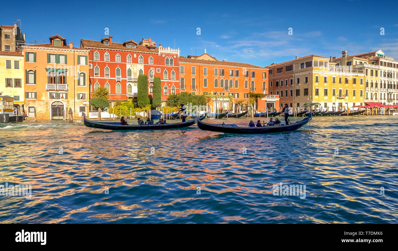 Gondolas on the Grand Canal in Venice, Italy, faces blurred Stock Photo