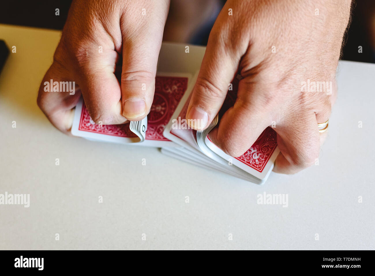 Magician holding playing cards hires stock photography and images Alamy