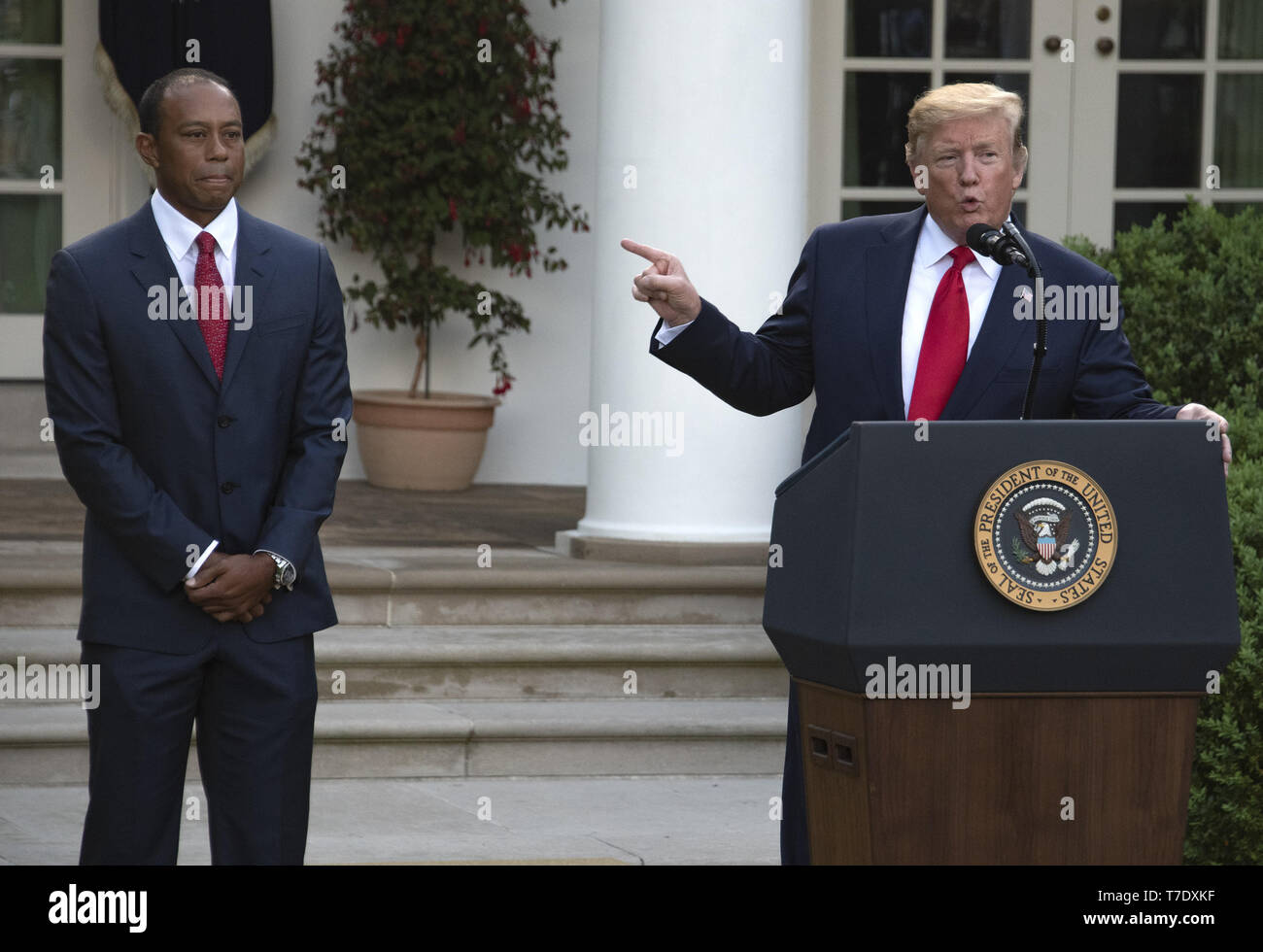 May 6, 2019 - Washington, District of Columbia, U.S. - United States President Donald J. Trump, right, makes remarks as he presents the Presidential Medal of Freedom to professional golfer Tiger Woods, left, in the Rose Garden of the White House in Washington, DC on May 6, 2019. The Presidential Medal of Freedom is an award bestowed by the President of the United States to recognize those people who have made ''an especially meritorious contribution to the security or national interests of the United States, world peace, cultural or other significant public or private endeavor.''.Credit: Ron Stock Photo