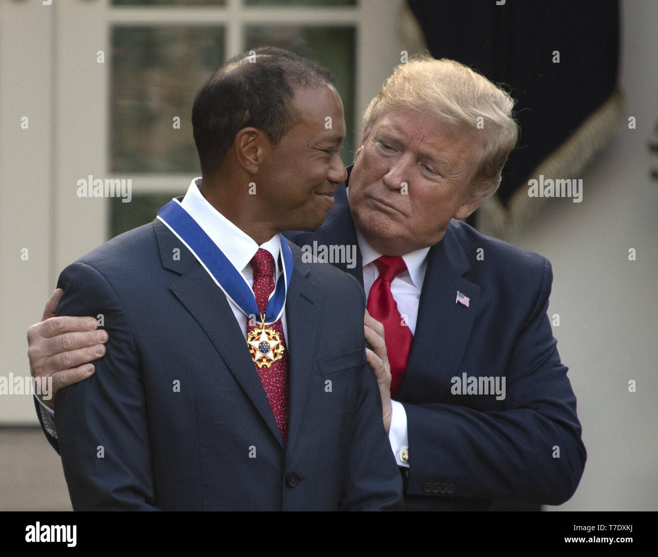 May 6, 2019 - Washington, District of Columbia, U.S. - United States President Donald J. Trump, right, hugs professional golfer Tiger Woods, left, after presenting him the Presidential Medal of Freedom in the Rose Garden of the White House in Washington, DC on May 6, 2019. The Presidential Medal of Freedom is an award bestowed by the President of the United States to recognize those people who have made ''an especially meritorious contribution to the security or national interests of the United States, world peace, cultural or other significant public or private endeavor.''.Credit: Ron Sachs Stock Photo